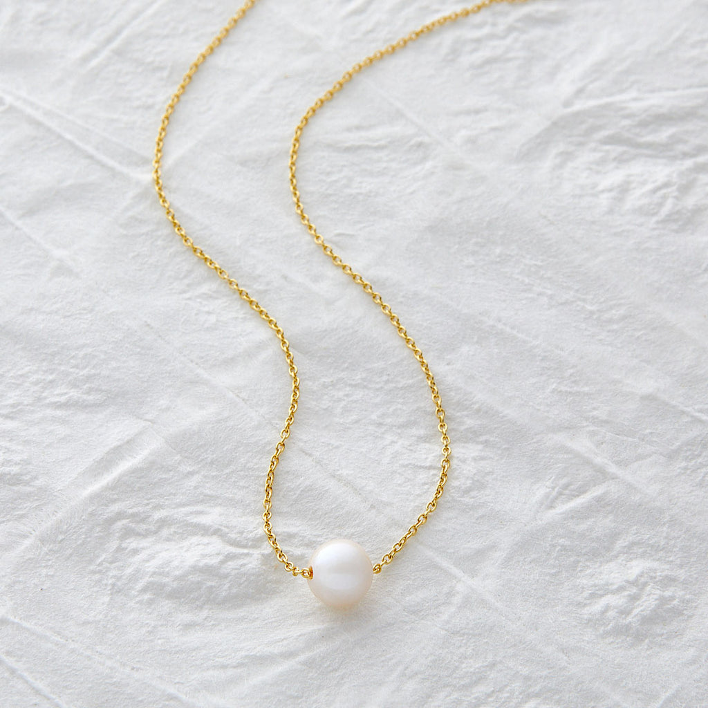 A MOMENT IN TIME NECKLACE