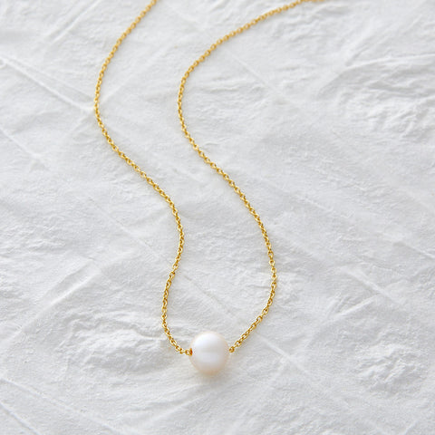 A MOMENT IN TIME NECKLACE