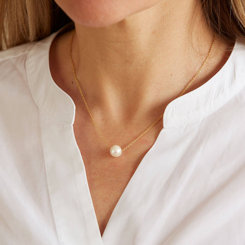 A MOMENT IN TIME NECKLACE